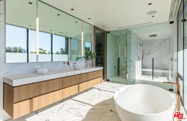 Bathroom, Dual Sink Vanities, Free Standing Baths, Glass Shower, Interior, Marble, Marble Walls, Recessed Lighting