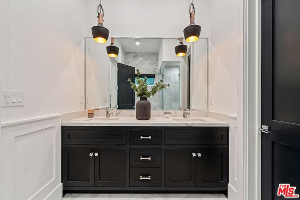 Bathroom, Dual Sink Vanities, Interior, Marble, Marble Walls, Pendant Lights