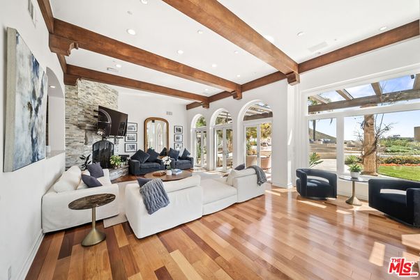Fireplace, Interior, Living room, Recessed Lighting, Stone Walls, Wooden Beams, Wood Texture Flooring