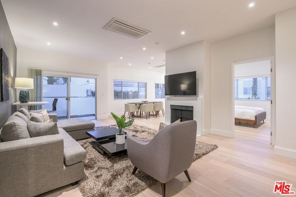 Dining room, Fireplace, Interior, Living room, Recessed Lighting, Wood Texture Flooring