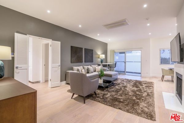 Fireplace, Interior, Living room, Recessed Lighting, Washer, Wood Texture Flooring