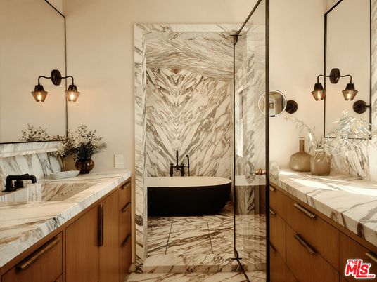 Bathroom, Dual Sink Vanities, Free Standing Baths, Interior, Marble, Marble Walls, Tile Countertops