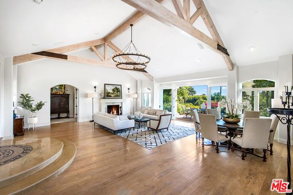 Chandelier, Dining room, Fireplace, Interior, Living room, Pendant Lights, Recessed Lighting, Wooden Beams, Wood Texture Flooring