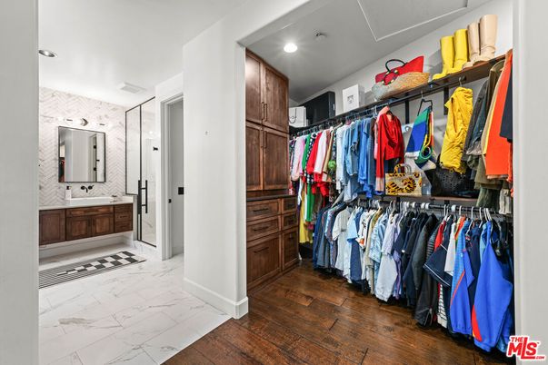 Bathroom, Dual Sink Vanities, Glass Shower, Interior, Marble, Recessed Lighting, Walk-in Closets, Wood Texture Flooring