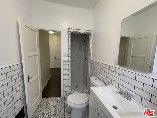 Bathroom, Glass Shower, Interior, Marble Walls, Wood Texture Flooring