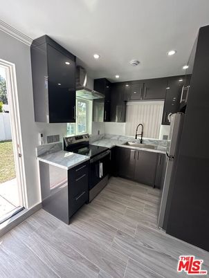 Interior, Kitchen, Marble Walls, Recessed Lighting, Wood Texture Flooring