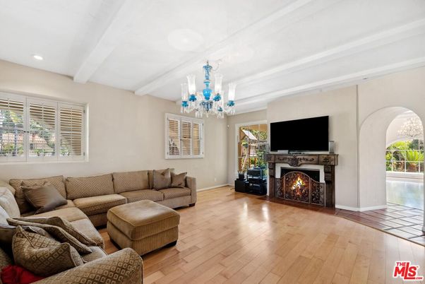 Chandelier, Fireplace, Interior, Living room, Recessed Lighting, Wood Texture Flooring