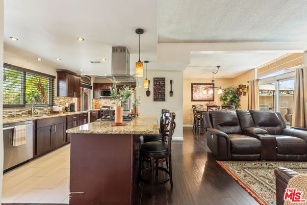 Dining room, Interior, Kitchen, Living room, Pendant Lights, Recessed Lighting, Stainless Steel Appliances, Wood Texture Flooring