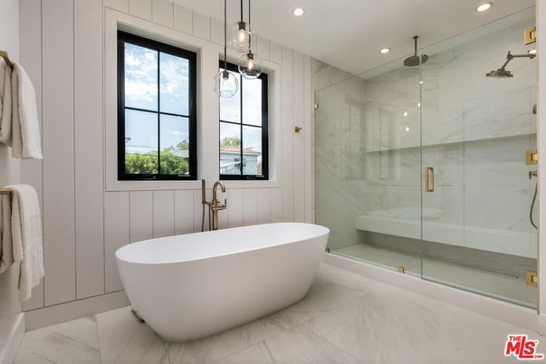 Bathroom, Free Standing Baths, Glass Shower, Interior, Marble, Marble Walls, Pendant Lights, Recessed Lighting