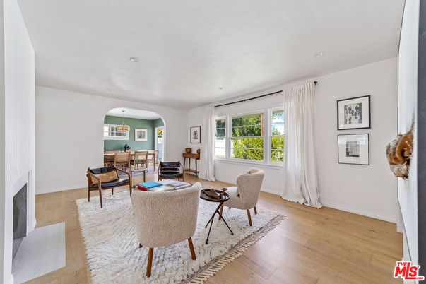 Dining room, Fireplace, Interior, Living room, Pendant Lights, Recessed Lighting, Wood Texture Flooring