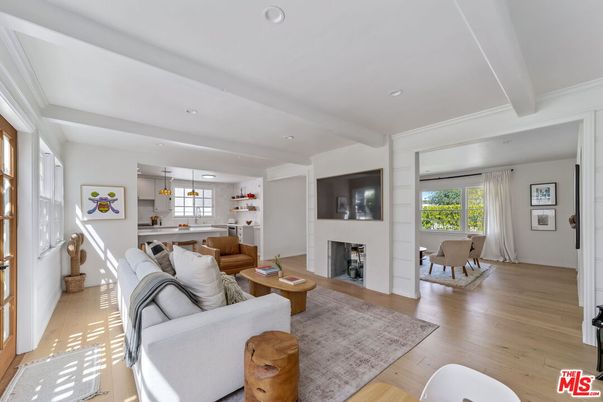 Dining room, Fireplace, Interior, Living room, Pendant Lights, Recessed Lighting, Wood Texture Flooring