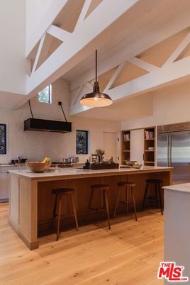 Interior, Kitchen, Pendant Lights, Stainless Steel Appliances, Stone Walls, Wood Texture Flooring