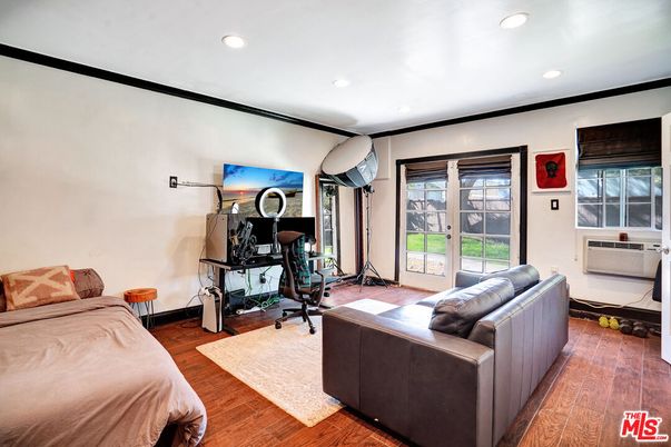 Bedroom, Fitness Equipment, Interior, Recessed Lighting, Wood Texture Flooring