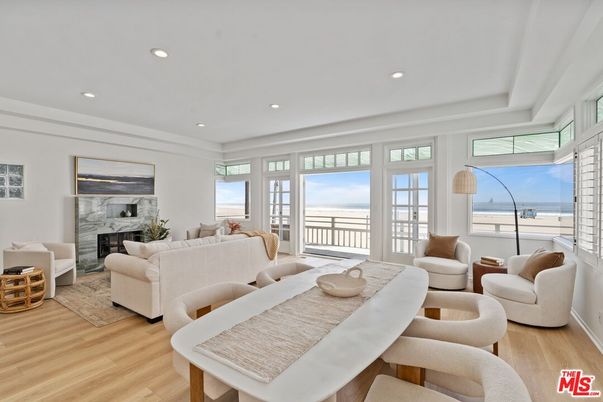 Dining room, Fireplace, Interior, Living room, Recessed Lighting, Wood Texture Flooring