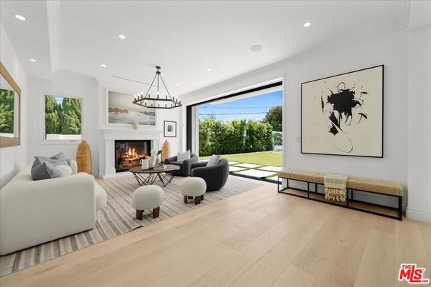 Chandelier, Fireplace, Interior, Living room, Pendant Lights, Recessed Lighting, Wood Texture Flooring