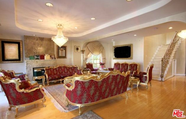 Chandelier, Fireplace, Interior, Living room, Recessed Lighting, Wood Texture Flooring