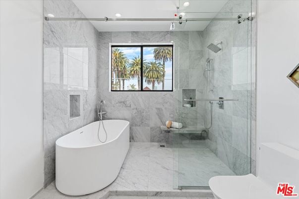 Bathroom, Free Standing Baths, Glass Shower, Interior, Marble, Marble Walls, Recessed Lighting