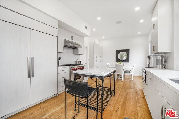 Dining room, Interior, Kitchen, Recessed Lighting, Stainless Steel Appliances, Wood Texture Flooring