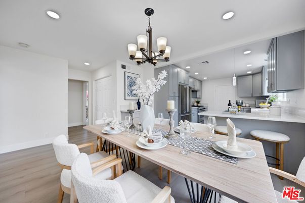 Chandelier, Dining room, Interior, Kitchen, Recessed Lighting, Stainless Steel Appliances, Wood Texture Flooring