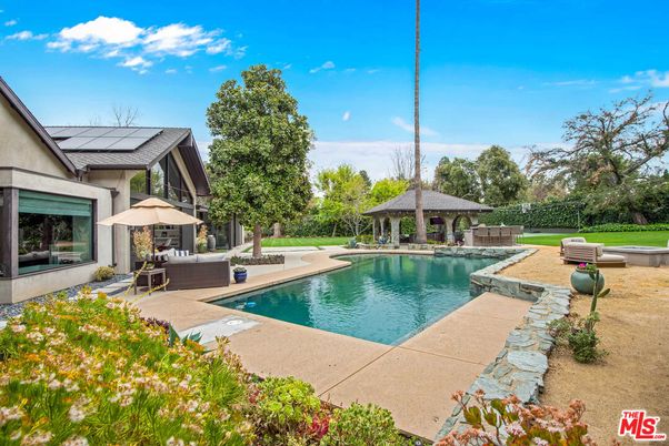 Exterior, Pool, Solar Panels
