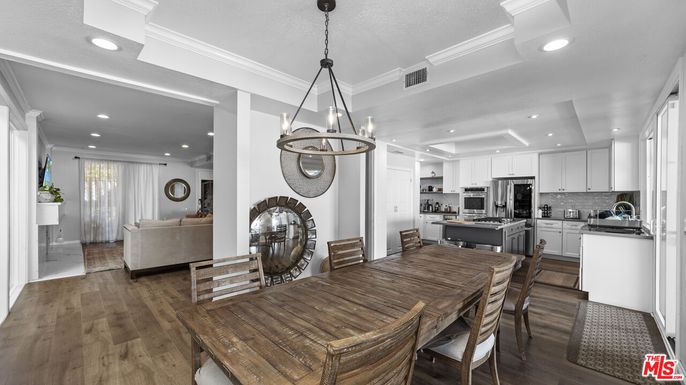 Dining room, Interior, Kitchen, Living room, Pendant Lights, Recessed Lighting, Stainless Steel Appliances, Wood Texture Flooring