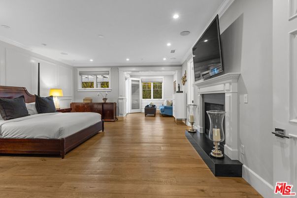 Bedroom, Fireplace, Interior, Recessed Lighting, Wood Texture Flooring