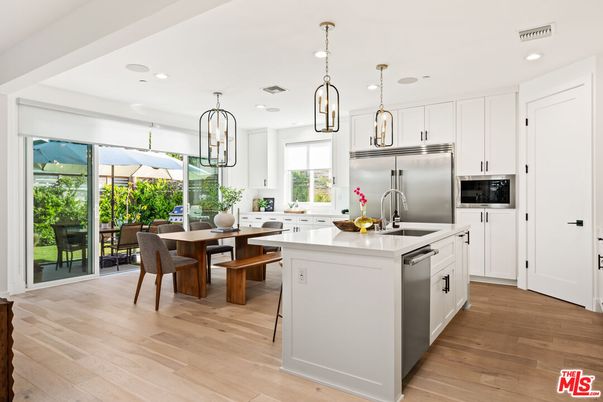 Dining room, Interior, Kitchen, Pendant Lights, Recessed Lighting, Stainless Steel Appliances, Wood Texture Flooring