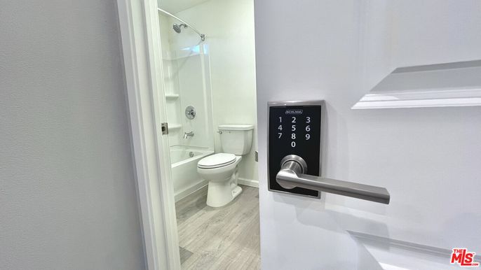 Bathroom, Glass Shower, Interior, Wood Texture Flooring
