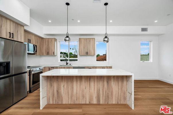 Interior, Kitchen, Pendant Lights, Recessed Lighting, Stainless Steel Appliances, Wood Texture Flooring