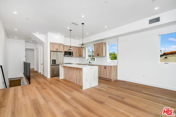Interior, Kitchen, Pendant Lights, Recessed Lighting, Stainless Steel Appliances, Wood Texture Flooring