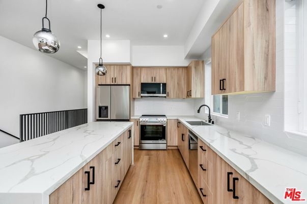 Interior, Kitchen, Pendant Lights, Recessed Lighting, Stainless Steel Appliances, Wood Texture Flooring