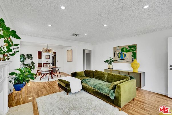 Dining room, Fireplace, Interior, Living room, Pendant Lights, Recessed Lighting, Wood Texture Flooring