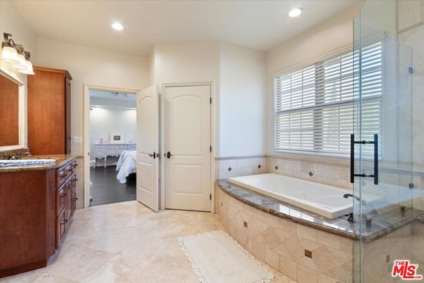 Bathroom, Bedroom, Glass Shower, Interior, Recessed Lighting, Wood Texture Flooring