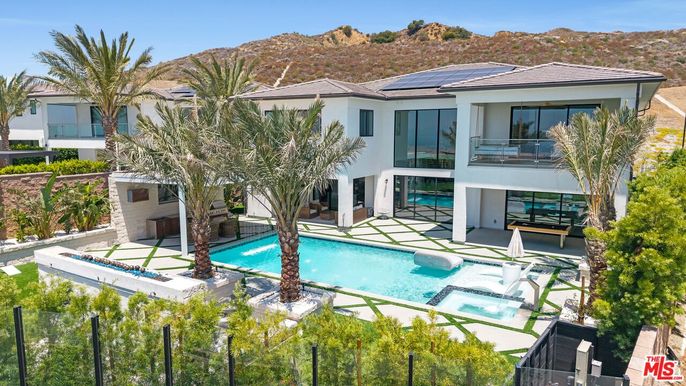 Exterior, Pool, Solar Panels