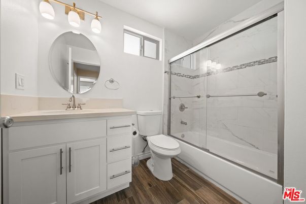 Bathroom, Glass Shower, Interior, Marble Walls, Wood Texture Flooring
