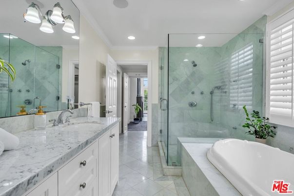 Bathroom, Dual Sink Vanities, Glass Shower, Interior, Marble, Marble Walls, Recessed Lighting