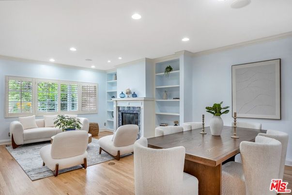 Dining room, Fireplace, Interior, Living room, Recessed Lighting, Wood Texture Flooring