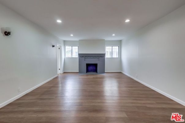 Empty room, Fireplace, Interior, Recessed Lighting, Wood Texture Flooring