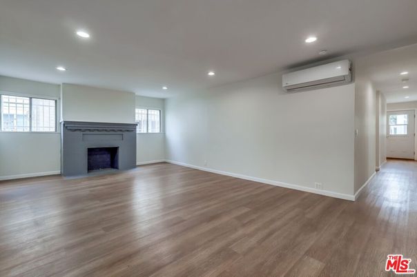 Empty room, Fireplace, Interior, Recessed Lighting, Wood Texture Flooring