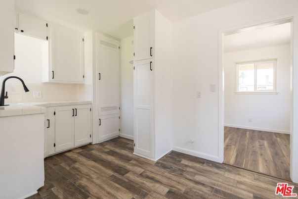 Interior, Kitchen, Tile Countertops, Wood Texture Flooring
