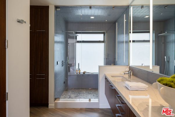 Bathroom, Dual Sink Vanities, Glass Shower, Interior, Recessed Lighting, Wood Texture Flooring