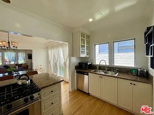 Chandelier, Dining room, Interior, Kitchen, Living room, Recessed Lighting, Stainless Steel Appliances, Wood Texture Flooring