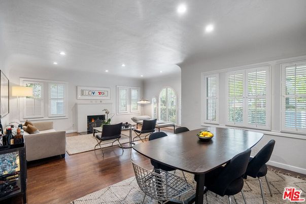 Dining room, Fireplace, Interior, Living room, Recessed Lighting, Wood Texture Flooring