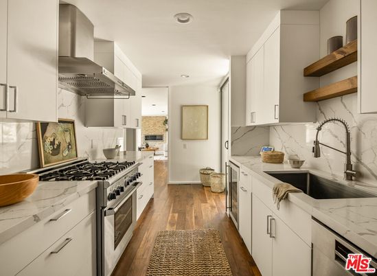 Interior, Kitchen, Marble Walls, Recessed Lighting, Stainless Steel Appliances, Wood Texture Flooring