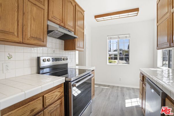 Interior, Kitchen, Tile Countertops, Wood Texture Flooring
