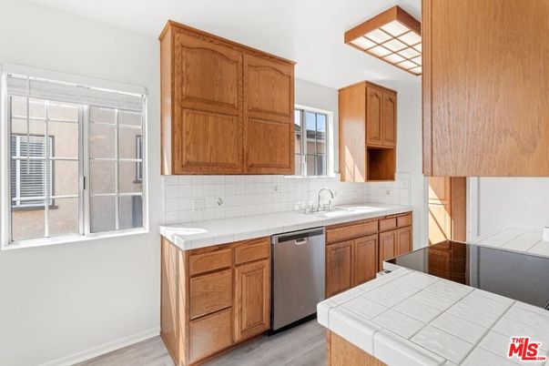 Interior, Kitchen, Tile Countertops, Wood Texture Flooring