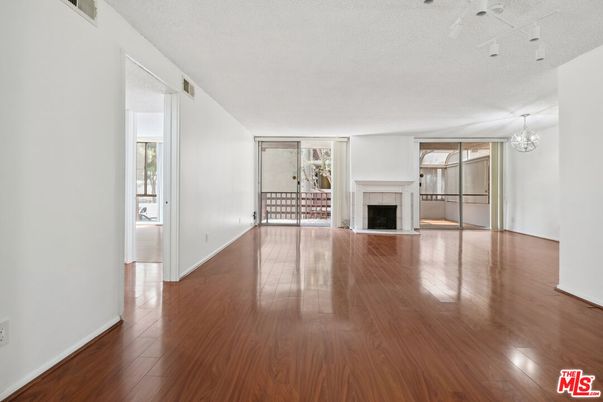 Chandelier, Empty room, Fireplace, Interior, Wood Texture Flooring