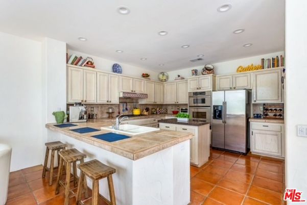 Interior, Kitchen, Recessed Lighting, Stainless Steel Appliances, Tile Countertops