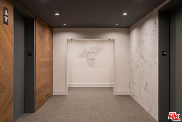 Elevator, Interior, Marble Walls, Recessed Lighting, Wooden Walls