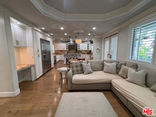 Chandelier, Interior, Kitchen, Living room, Recessed Lighting, Stainless Steel Appliances, Wood Texture Flooring